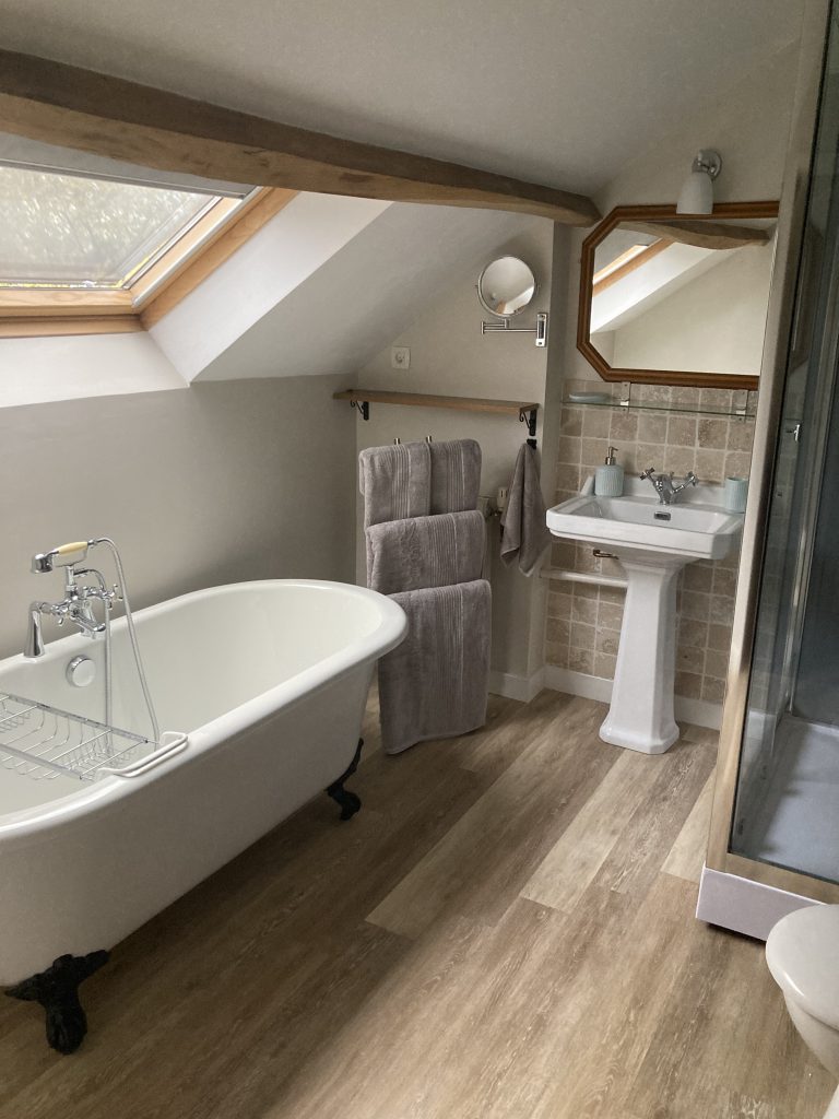 The B&B family room ensuite bathroom with rolltop bath