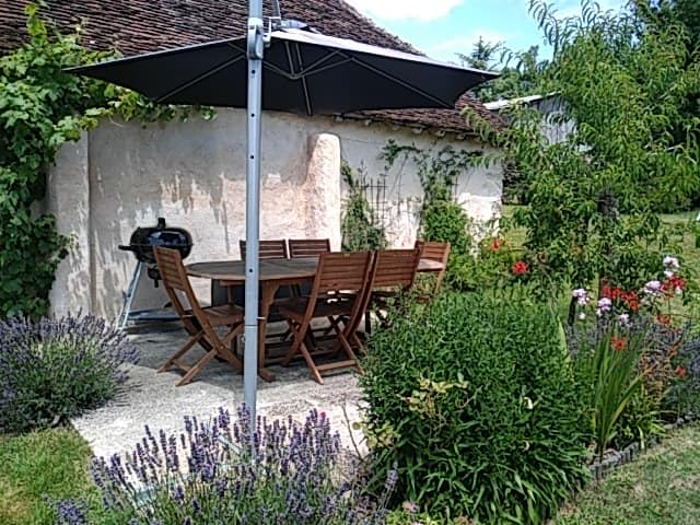 The fully fenced and secure wrap around Gite garden with a lovely patio area ideal for al fresco dining
