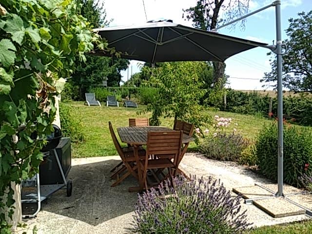The fully fenced and secure wrap around Gite garden with a lovely patio area ideal for al fresco dining