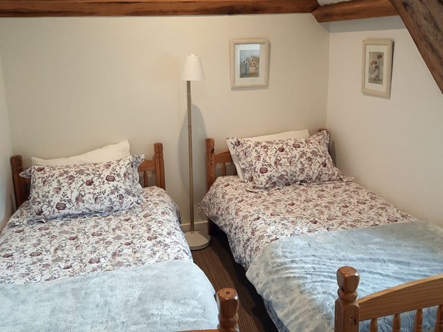 The Gite has a lovely twin room with two single beds which can be configured as bunk beds.